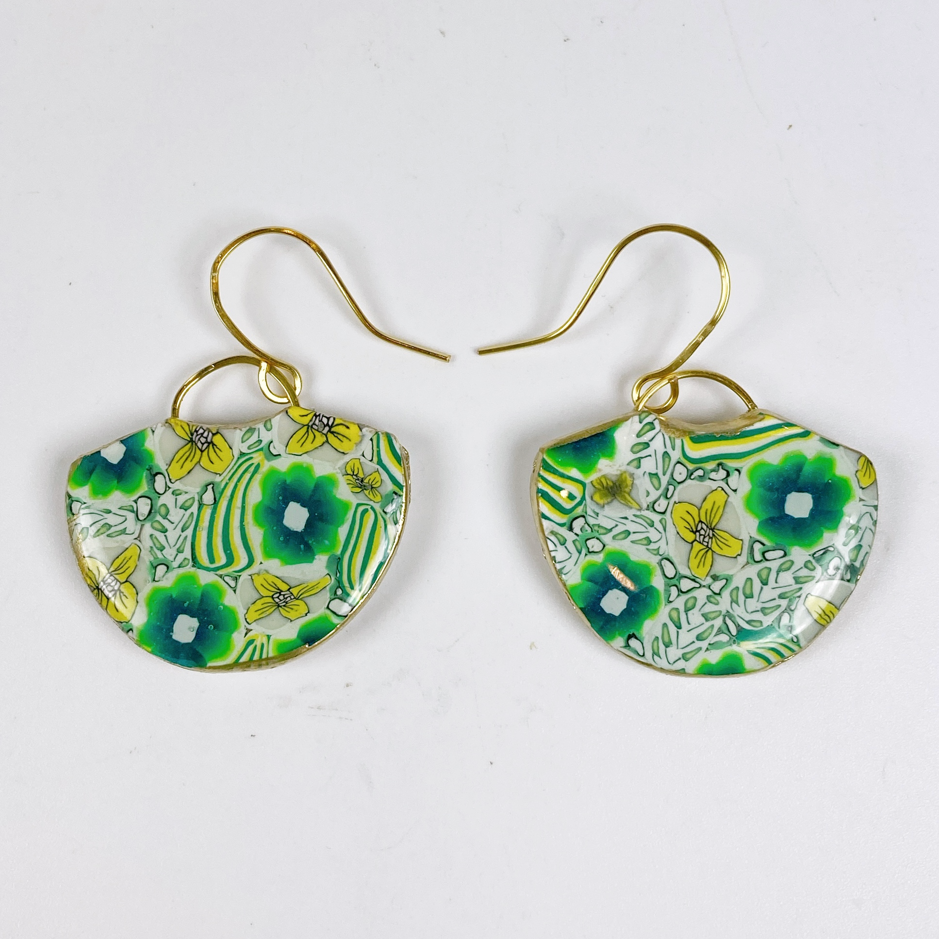 Green Flower Handmade Polymer Clay Earrings on a white background